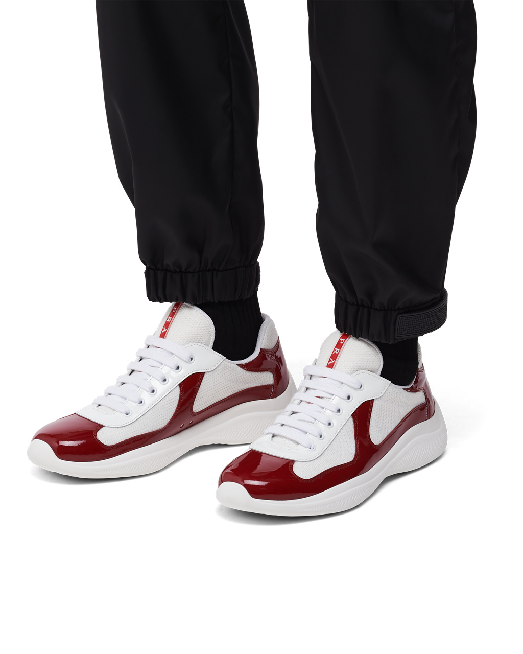 Red and best sale white prada sneakers